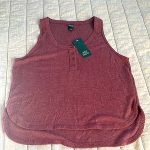 New with tags, medium tank. Smoke free home.